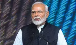 PM interacts with students aboard cruise ship on river Brahmaputra in Assam