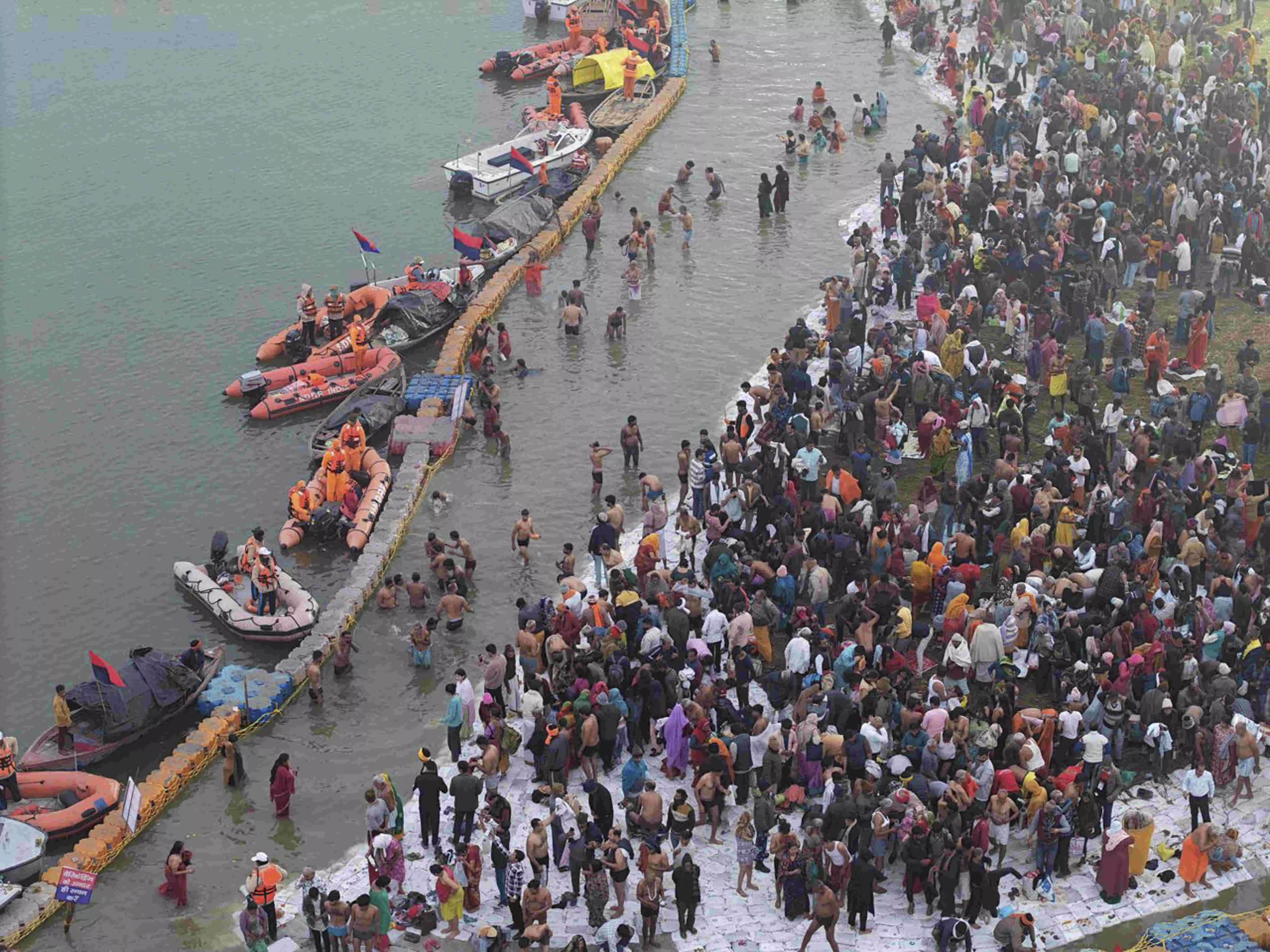 Lakhs bathe in freezing Sangam waters as Magh Mela begins in Prayagraj Lakhs bathe in freezing Sangam waters as Magh Mela begins in Prayagraj