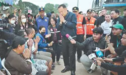 Construction crane falls onto train in Thailand; 30 killed