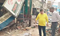 Night-time shop demolition triggers arrests, political row