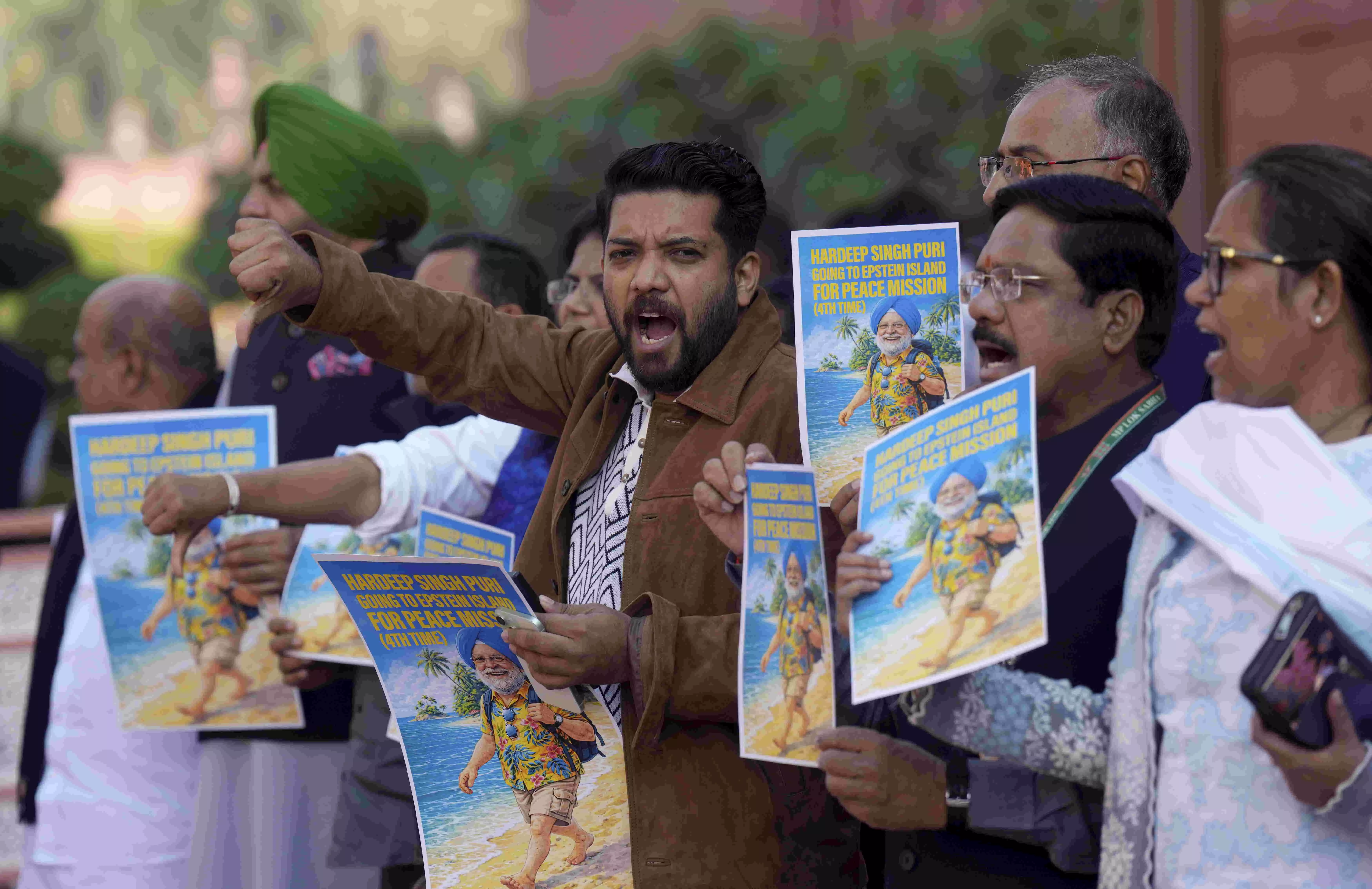 Cong MPs protest against Hardeep Puri, seek his resignation Cong MPs protest against Hardeep Puri, seek his resignation