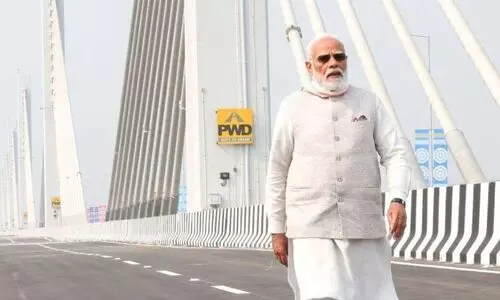 Modis historic touchdown in Assam; Inaugurates bridge on Brahmaputra | Unveils IIM, data centre