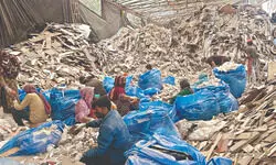 Garbage piles up as the global AI summit draws massive crowds