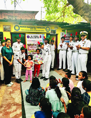 Women’s Day: NCC cadets distribute books at Kolkata slum