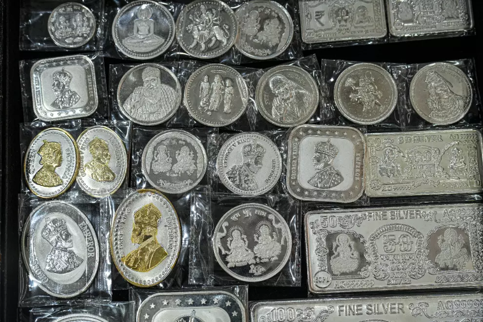 Silver slides Rs 3,400 to Rs 2.68 lakh/kg, gold stays flat on strong dollar Silver slides Rs 3,400 to Rs 2.68 lakh/kg, gold stays flat on strong dollar