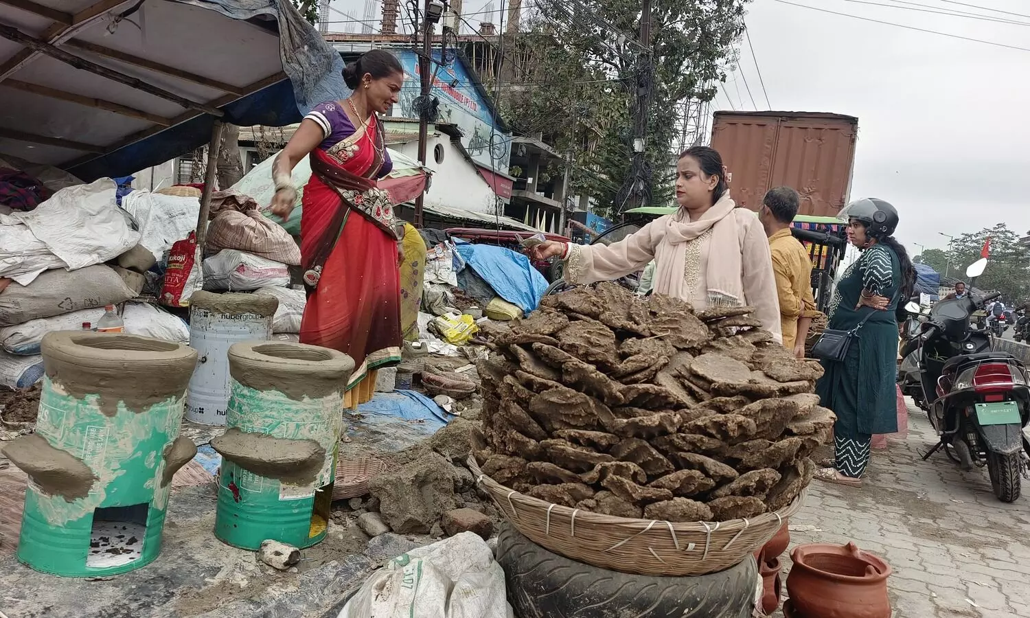 LPG shortage turns back the clock: Coal, stoves & dung cakes make comeback