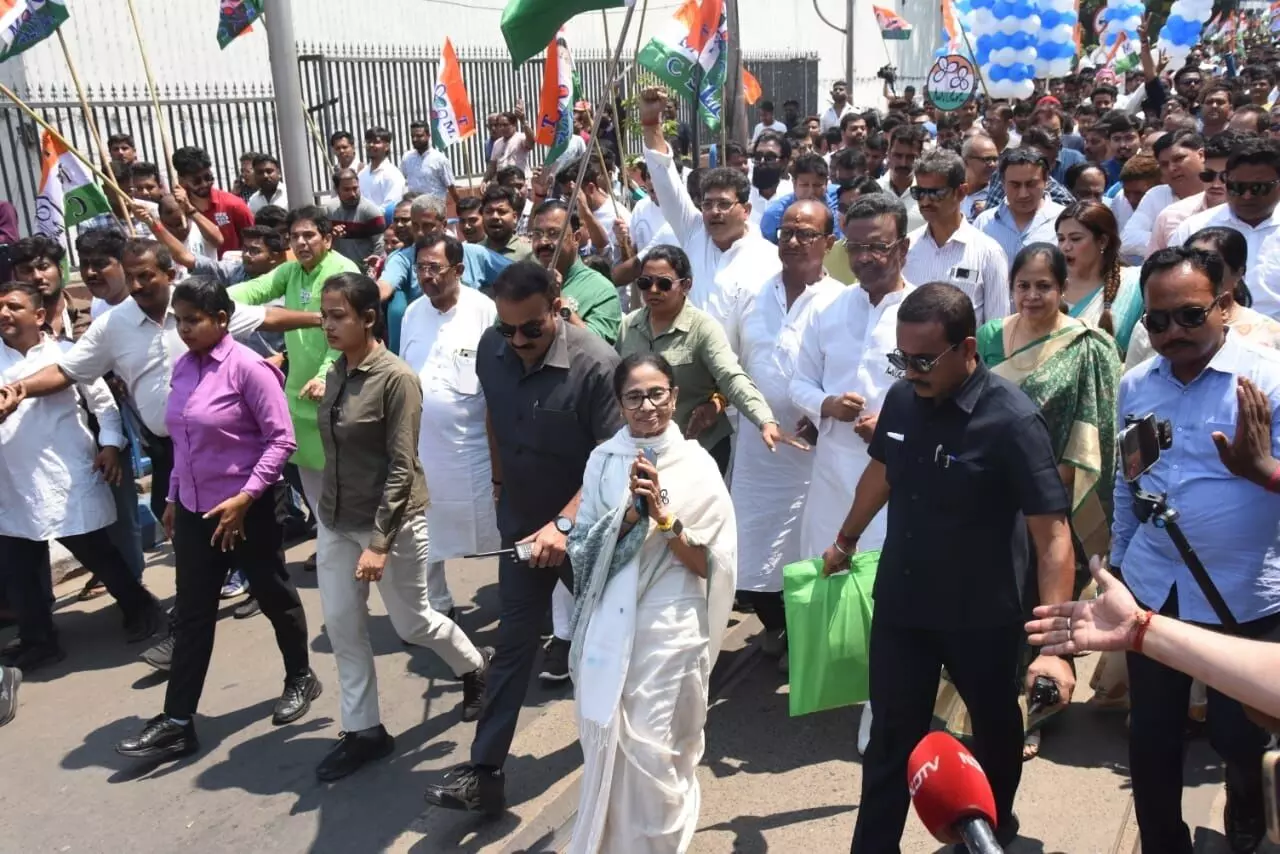 Mamata walks through a sea of supporters to file nomination Mamata walks through a sea of supporters to file nomination