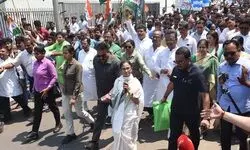 Mamata walks through a sea of supporters to file nomination