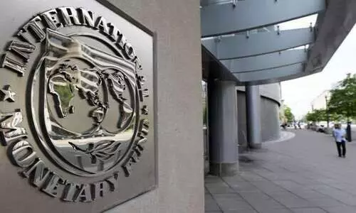Citing fallout from the Iran war, IMF cuts the outlook for global growth, expects higher inflation