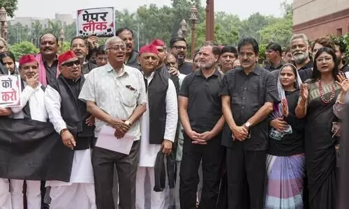 Oppn MPs wear black to parliament, stage protest against police brutality on student protestors Oppn MPs wear black to parliament, stage protest against police brutality on student protestors