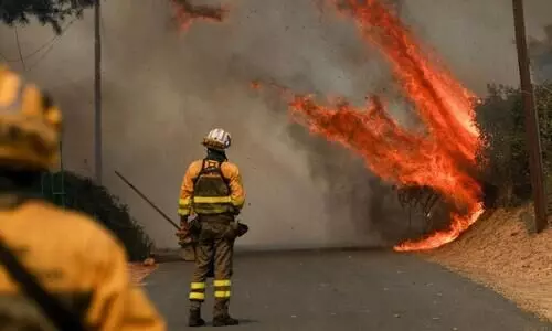 Over 200,000 people flee raging wildfires in France and Spain; some escaping by boat Over 200,000 people flee raging wildfires in France and Spain; some escaping by boat