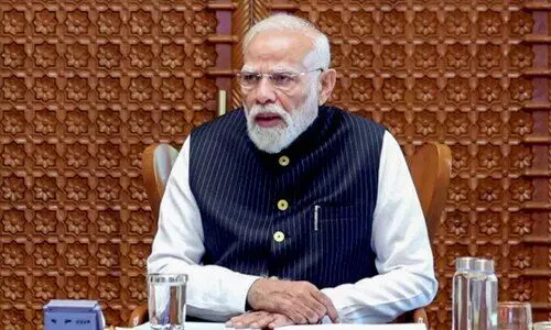 PM lauds Jan Dhan PM lauds Jan Dhan
